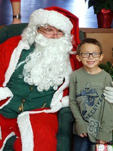 Photo of Santa and a friend