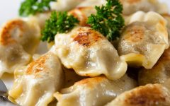 A photo of a plate of pierogi